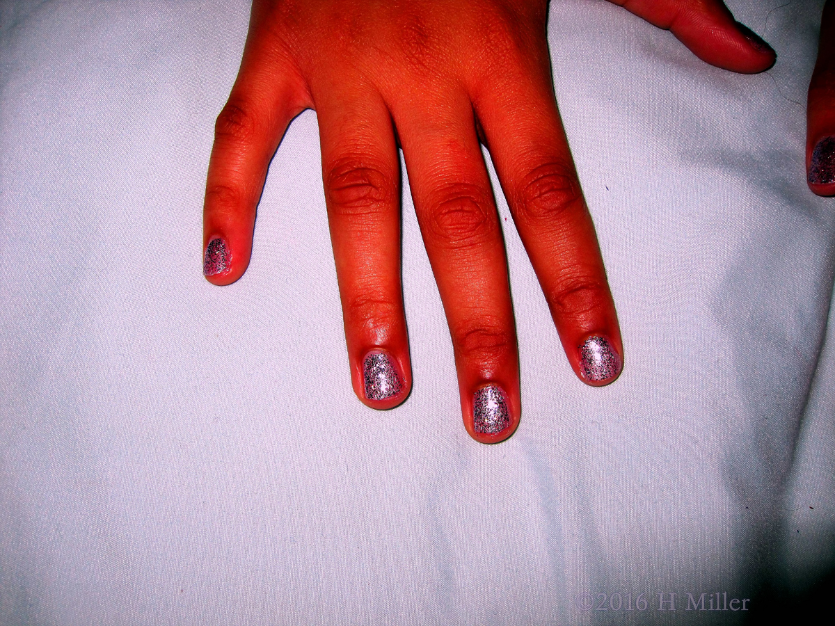 Silver Sparkles On This Girls Mani! 