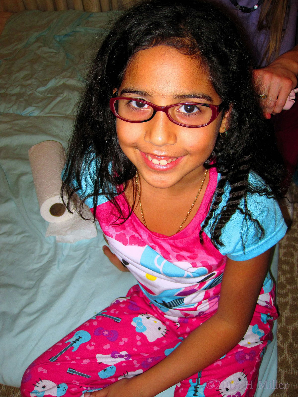 Spa Girl Sitting On The Blue Mat, Taking A Break From Kids Spa Activities!