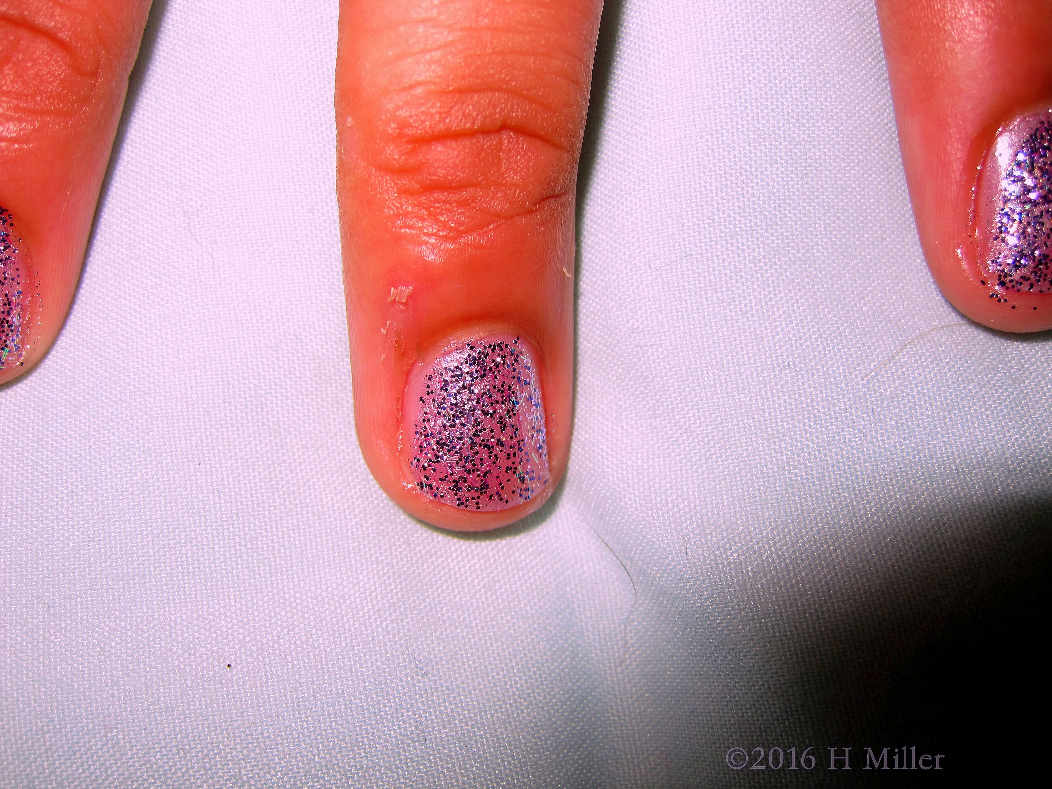 Close Up Of Silver Sparkle Manicure For Girls! Close Up Of Silver Sparkle Manicure For Girls!