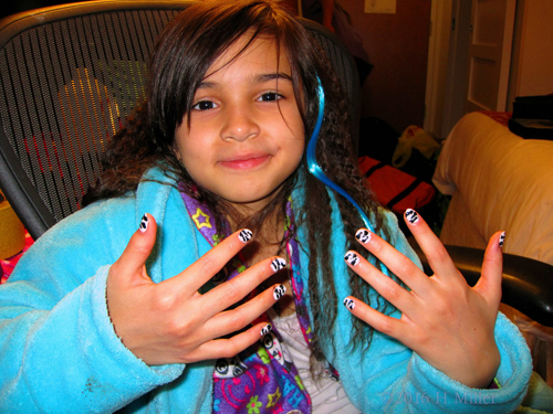 Big Smile With Zebra Nail Art On Her Girls Manicure!