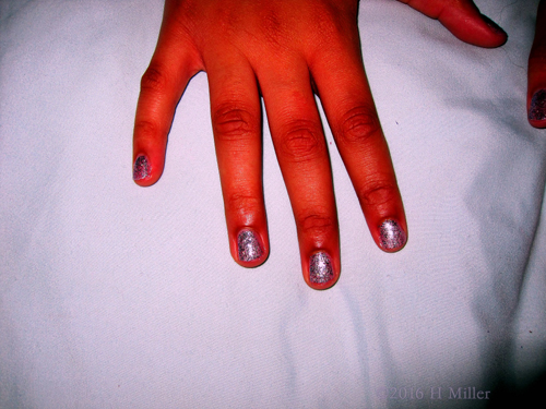 Silver Sparkles On This Girls Mani!
