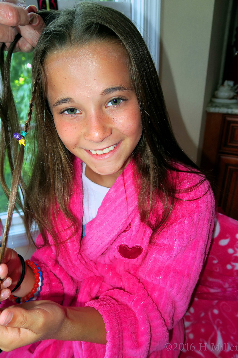 The Birthday Girl Smiling During Hairstyles. The Birthday Girl Smiling During Hairstyles.