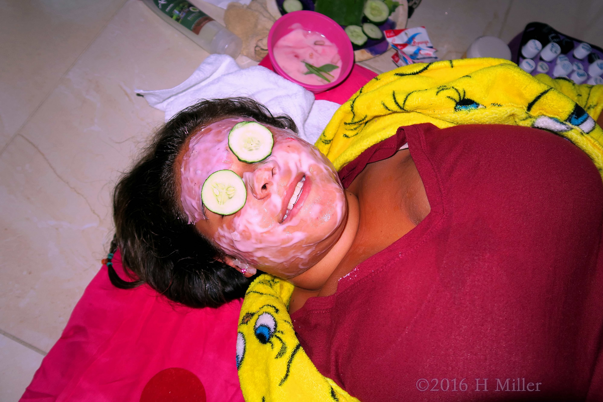 Smiling Wide During Her Strawberry Facial. 