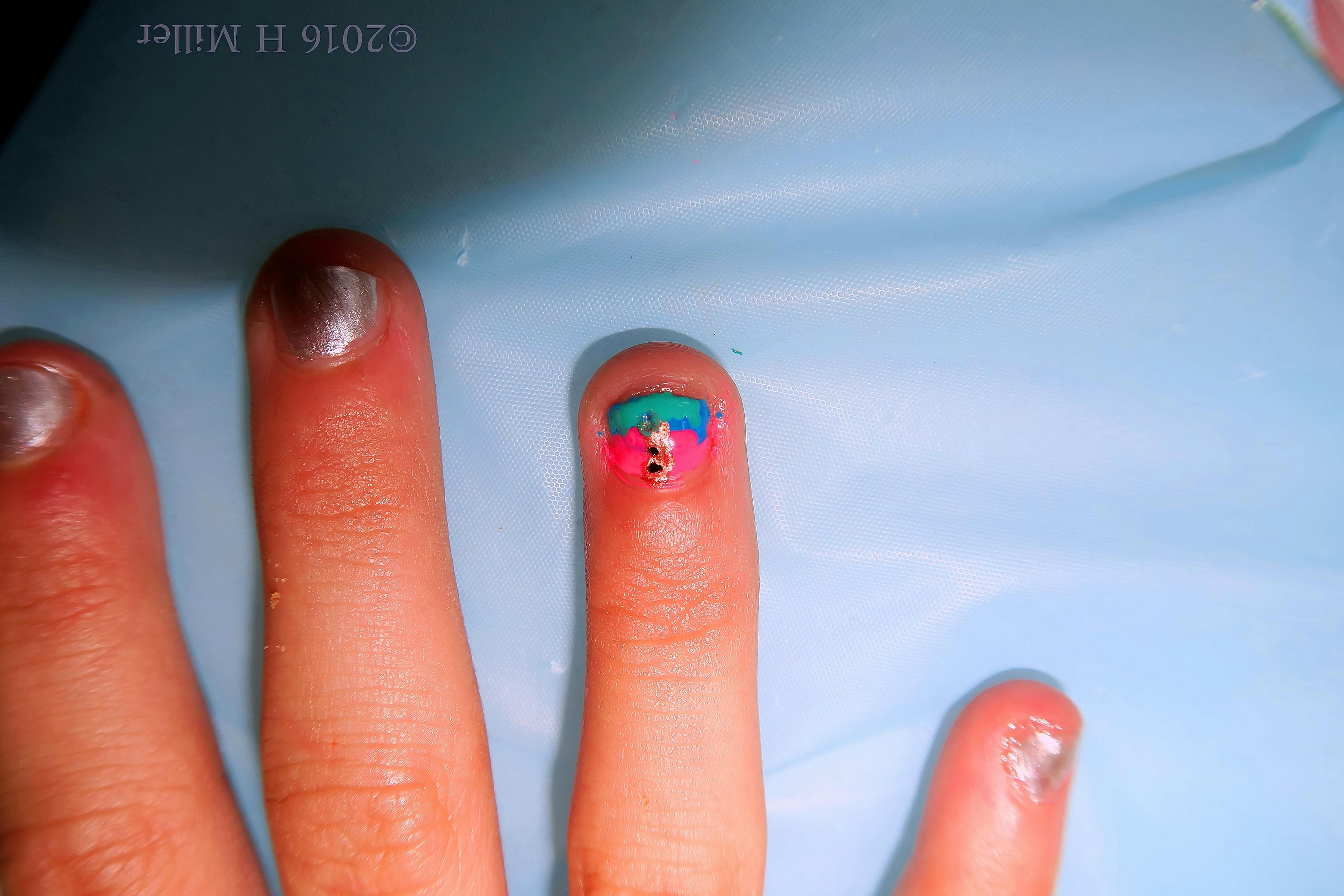 Adorable Gold, Pink, And Blue Accent Nail For A Silver Mani. Adorable Gold, Pink, And Blue Accent Nail For A Silver Mani.