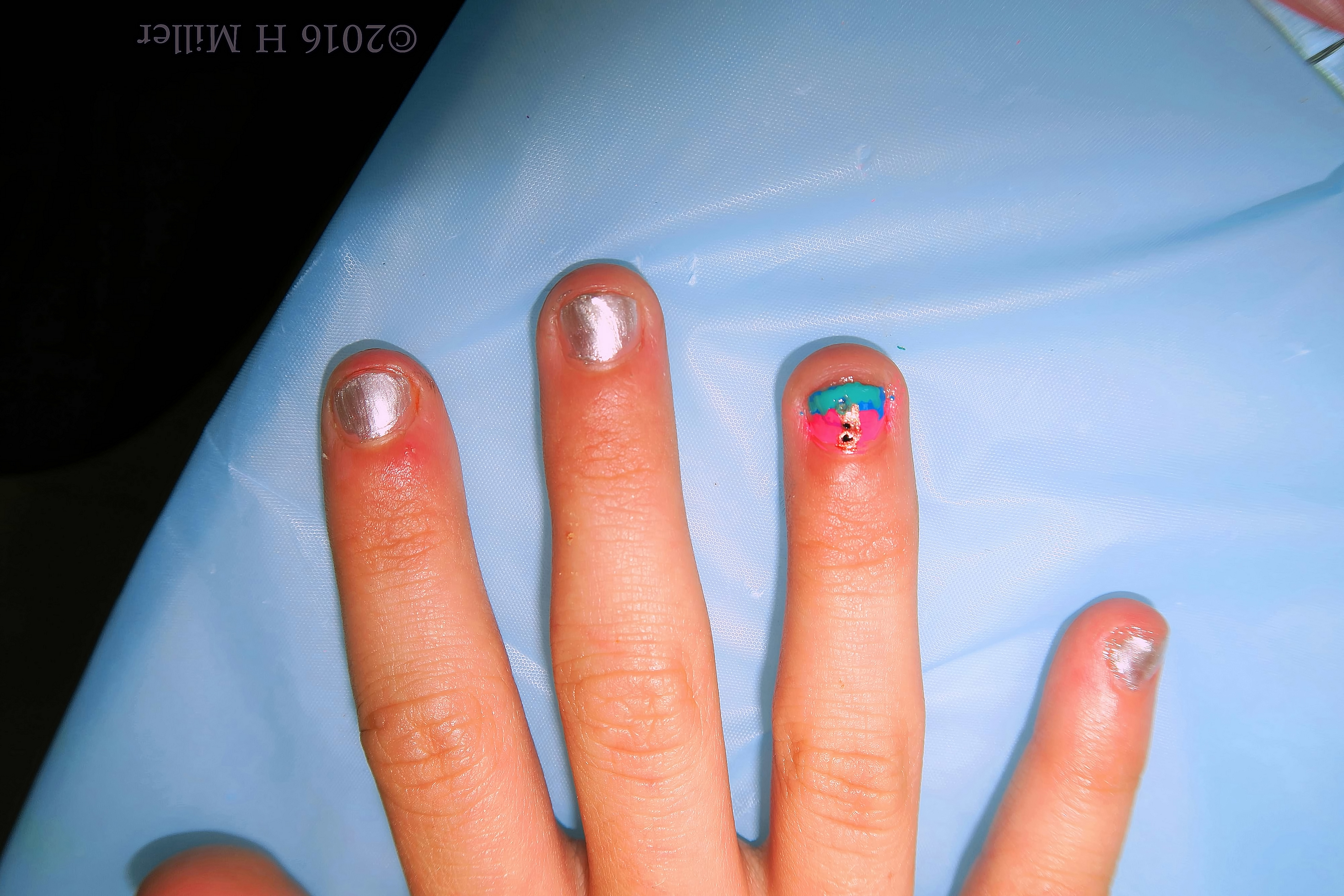 Cute Silver, Pink, And Blue Kids Manicure. Cute Silver, Pink, And Blue Kids Manicure.