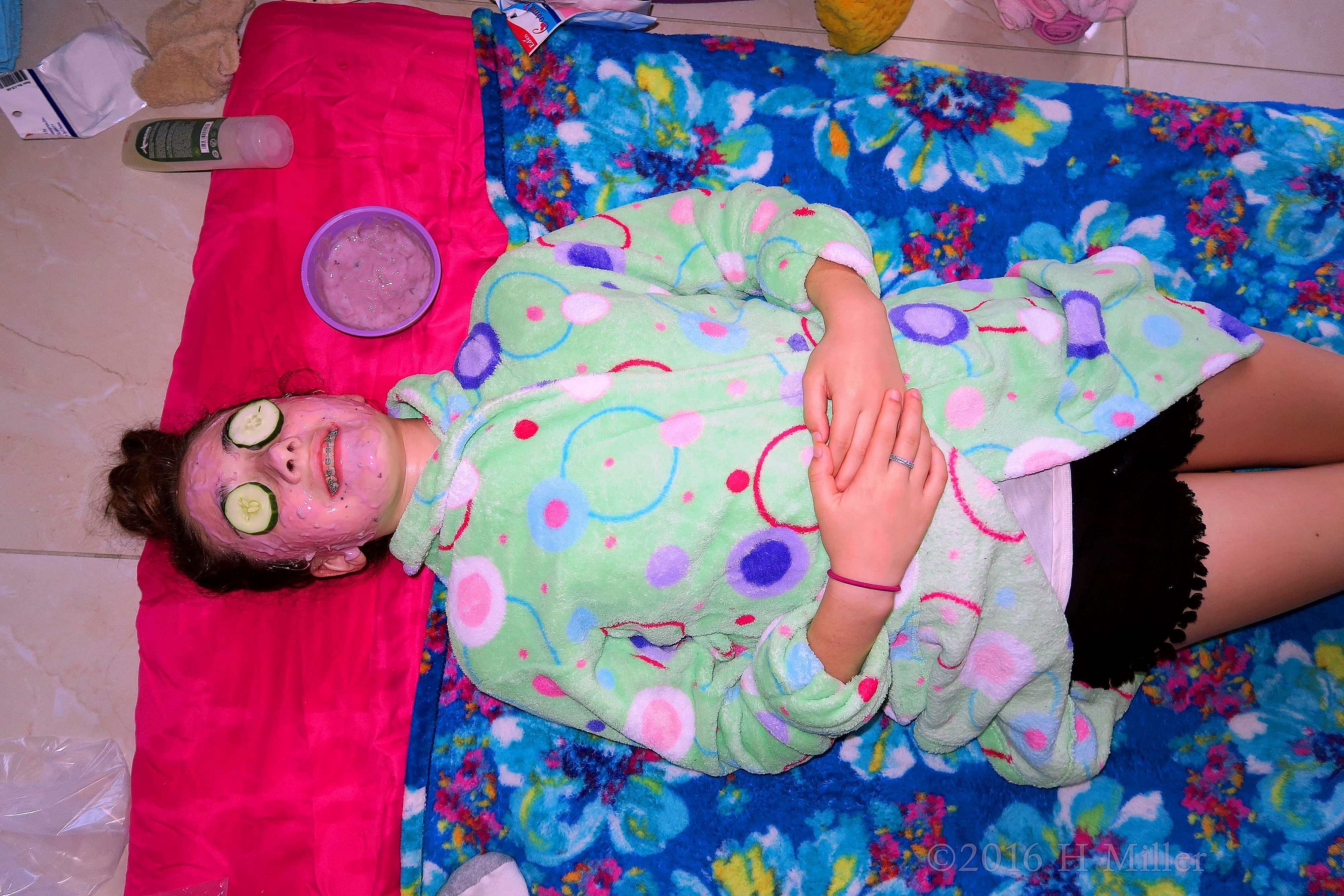 Smiling And Relaxed In A Kids Blueberry Facial. Smiling And Relaxed In A Kids Blueberry Facial.