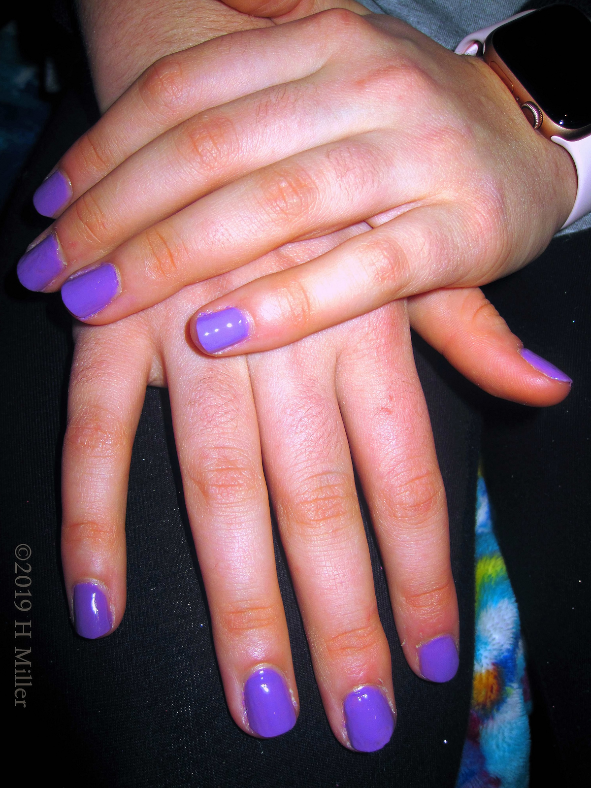 Pretty Purple Girls Manicure On This Party Guest.