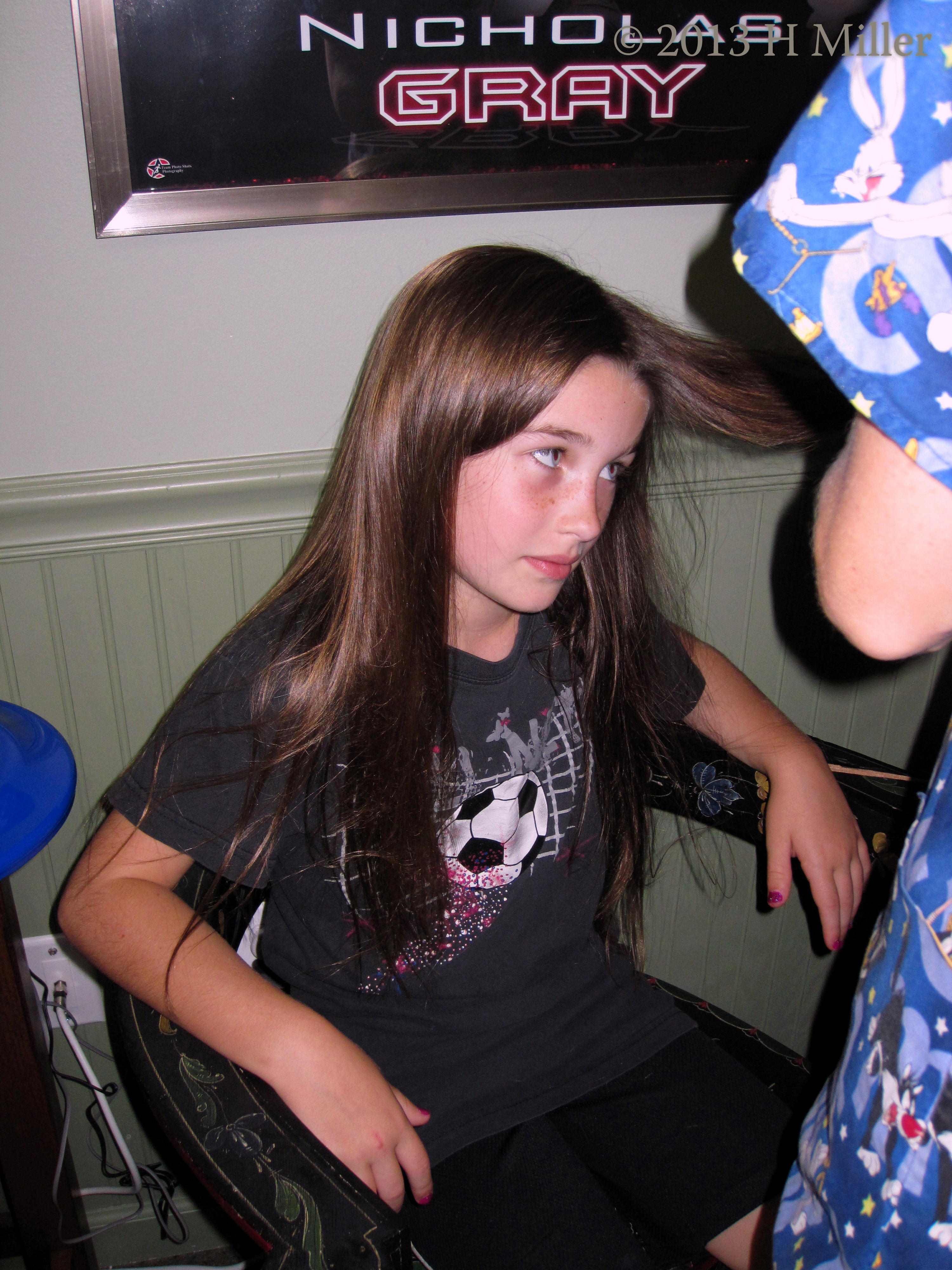 Sitting Patiently While Her Hair Gets Braided Sitting Patiently While Her Hair Gets Braided