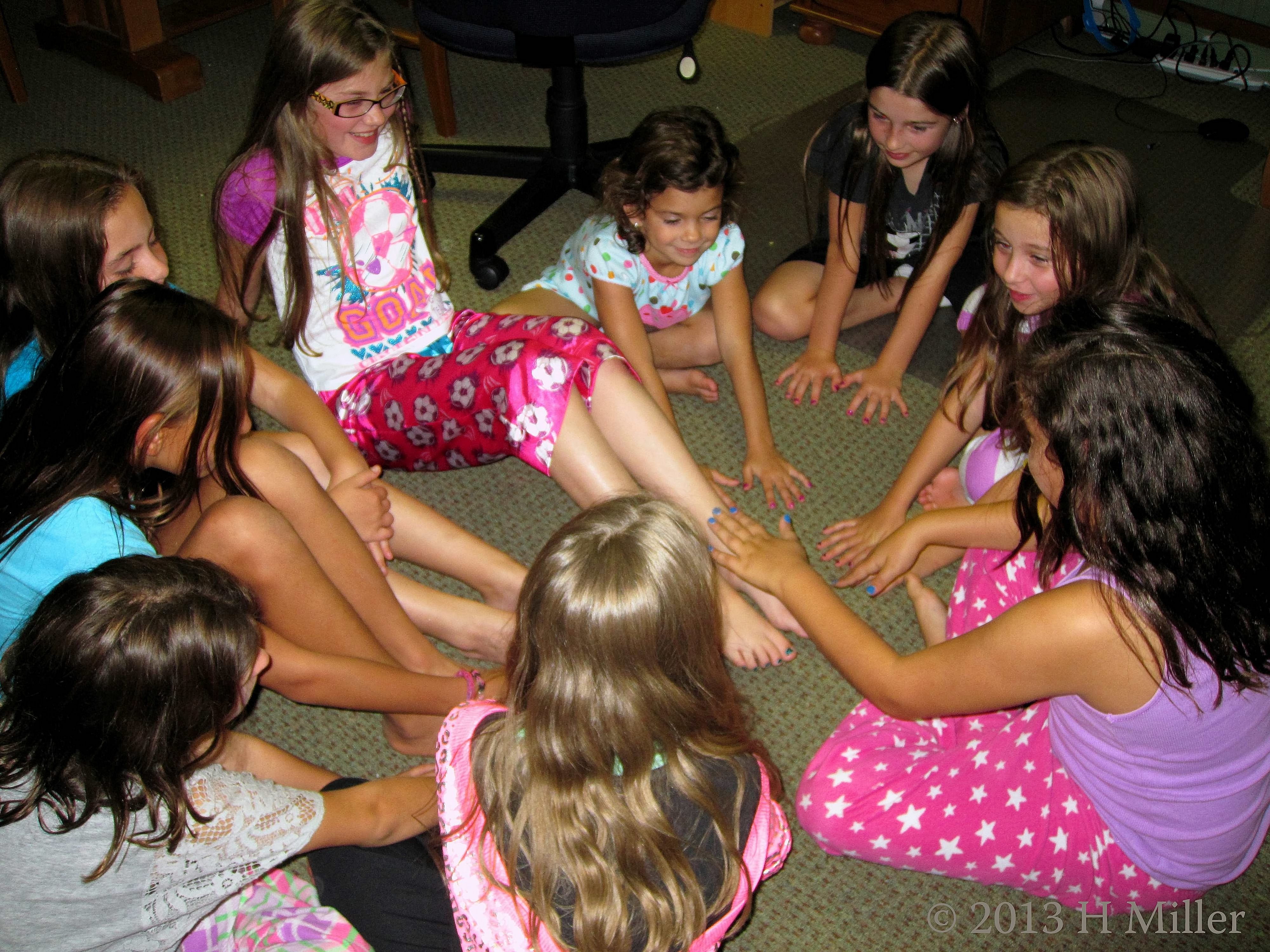 The Girls Admiring One Another's Nail Art. The Girls Admiring One Another's Nail Art.
