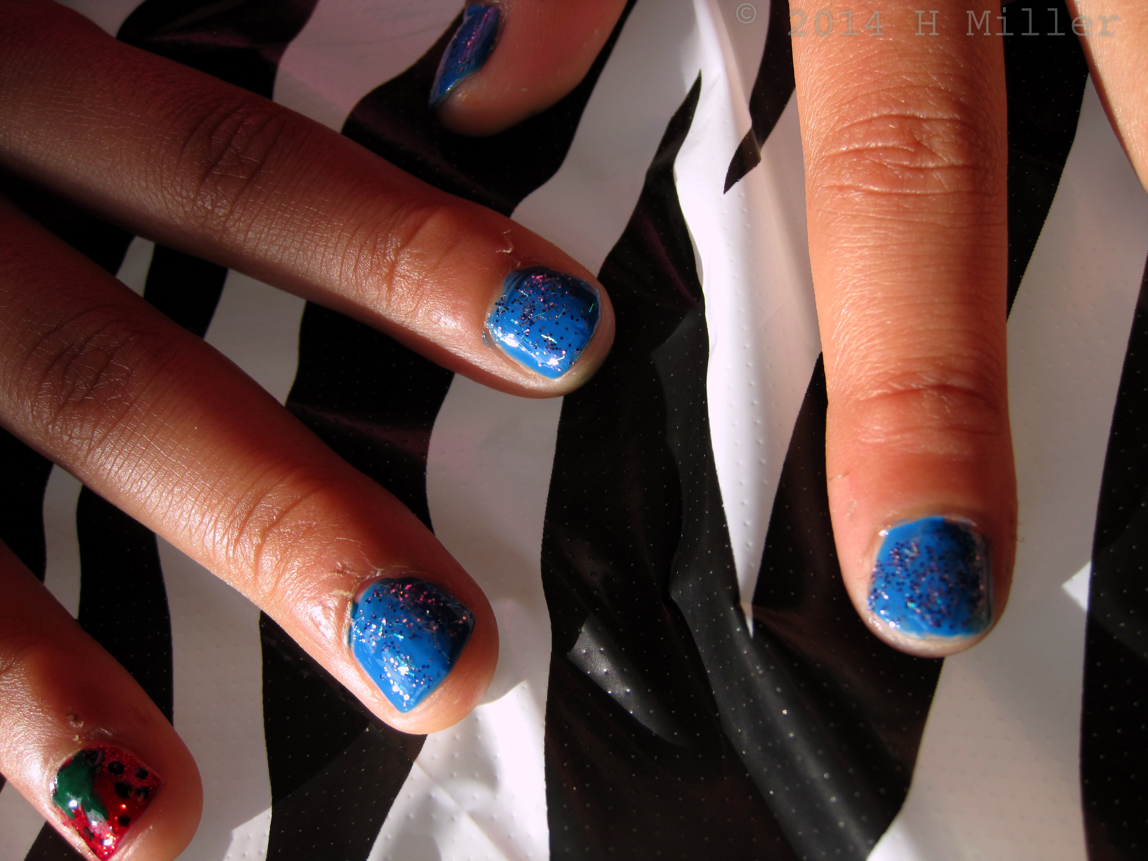 Kids Mini Mani Blue Nails With Sparkles And Strawberries! Kids Mini Mani Blue Nails With Sparkles And Strawberries!