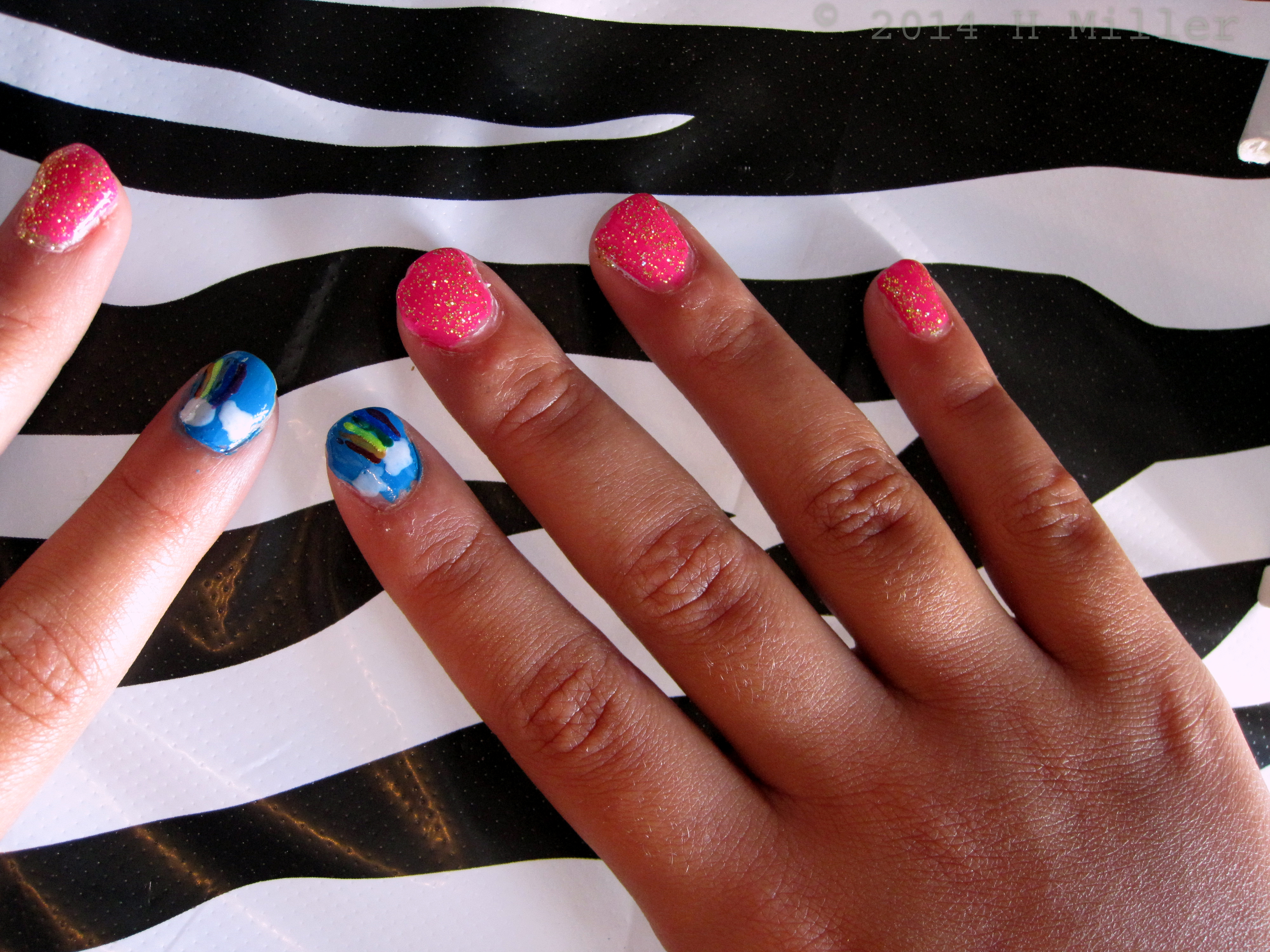Mini Mani Close Up Of Pink Glittery Nails. Mini Mani Close Up Of Pink Glittery Nails.