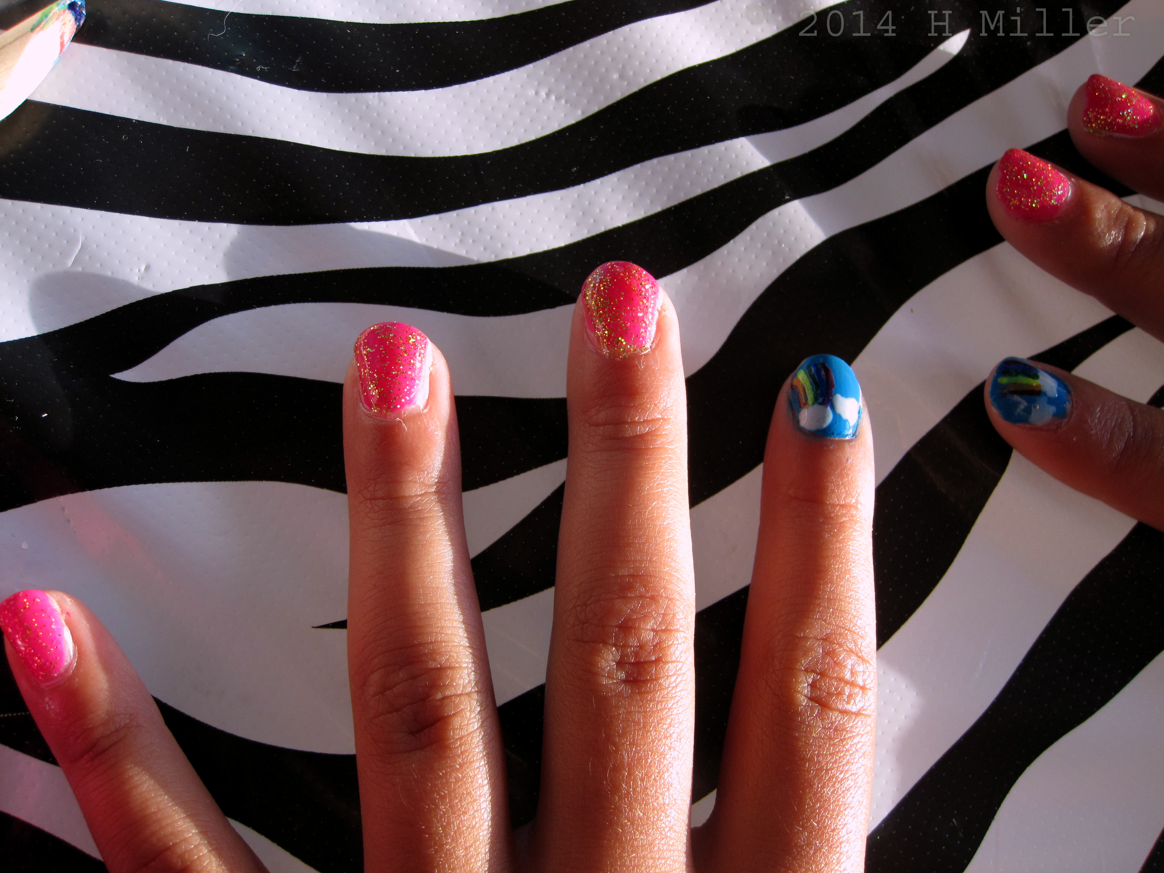 Pink And Sparkle Nail Art With Rainbows And Sky 