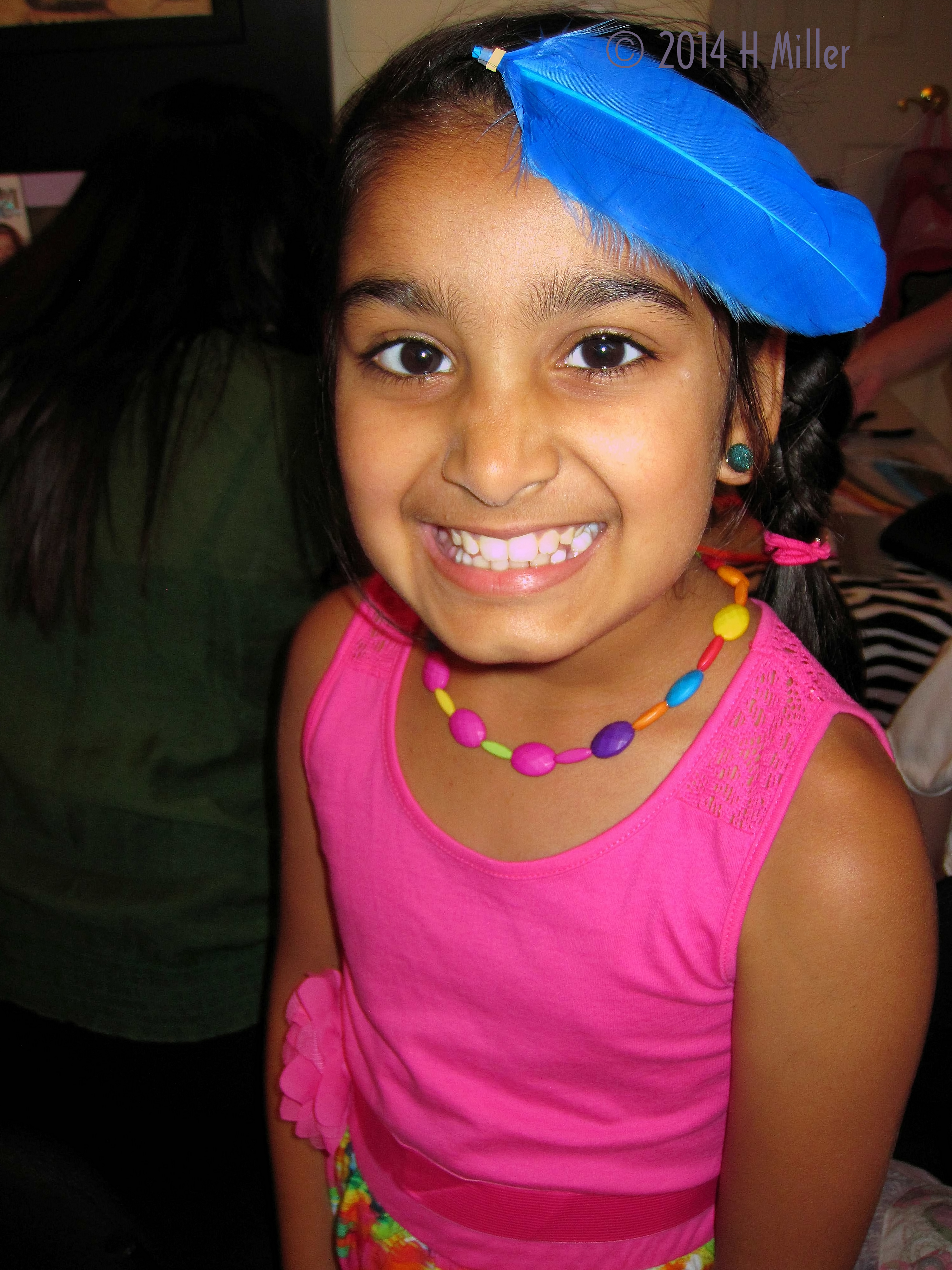 Colorful Blue Feather For Her Hair.