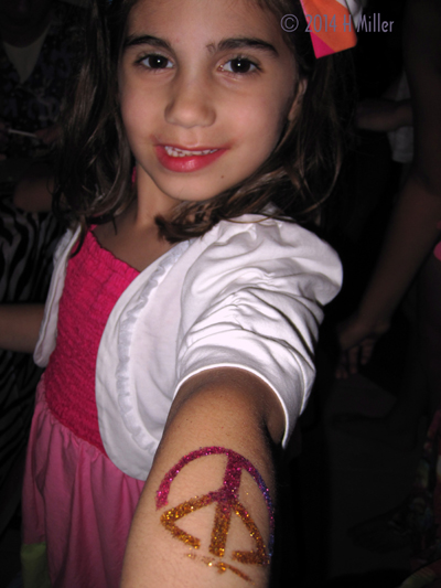 Body Glitter Art Peace Sign In Red Body Glitter Art Peace Sign In Red