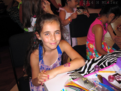 Hanging Out While Other Guests Recieve Their Glitter Tattoos Hanging Out While Other Guests Recieve Their Glitter Tattoos