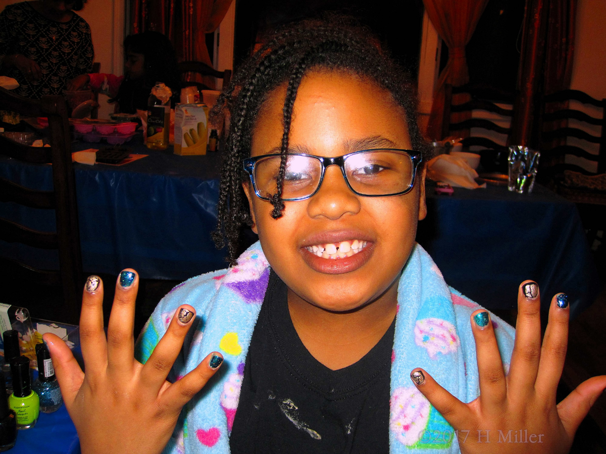 Smiling And Happy With Her Awesome Gold Shatter And Blue Glittery Mini Mani! 
