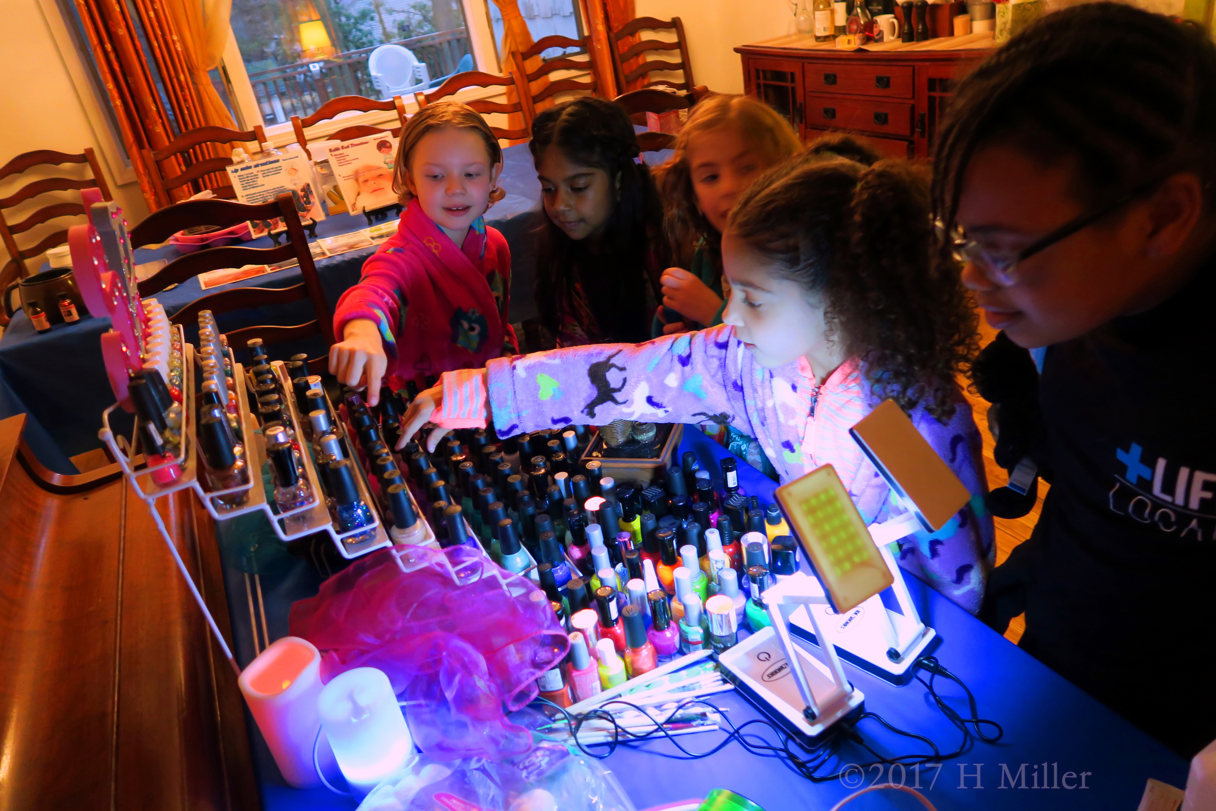 Choosing Their Favorite Nail Polish At The Kids Spa. Choosing Their Favorite Nail Polish At The Kids Spa.