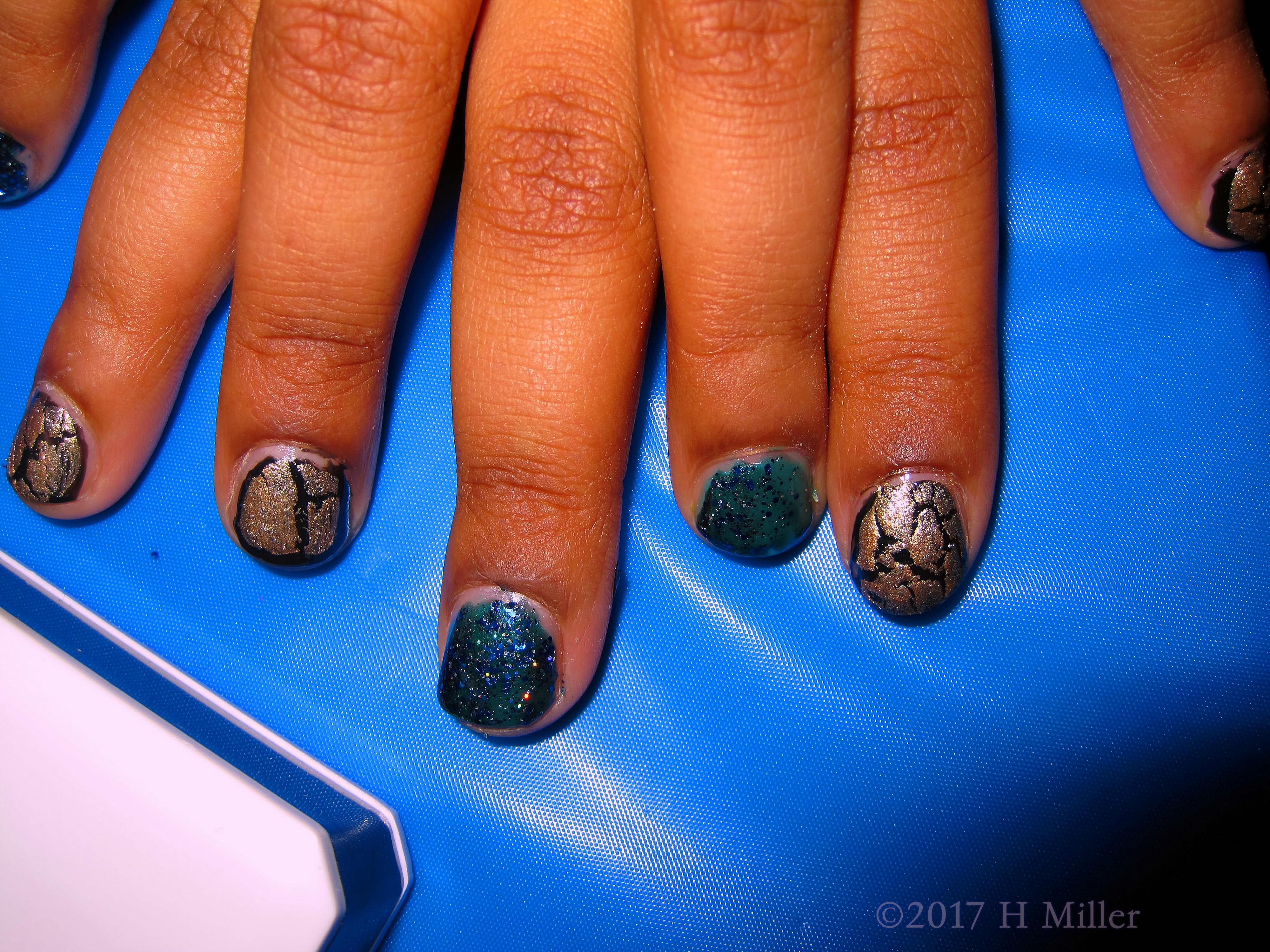 Gold Shatter And Super Sparkly Blue For This Girls Mini Mani! Gold Shatter And Super Sparkly Blue For This Girls Mini Mani!