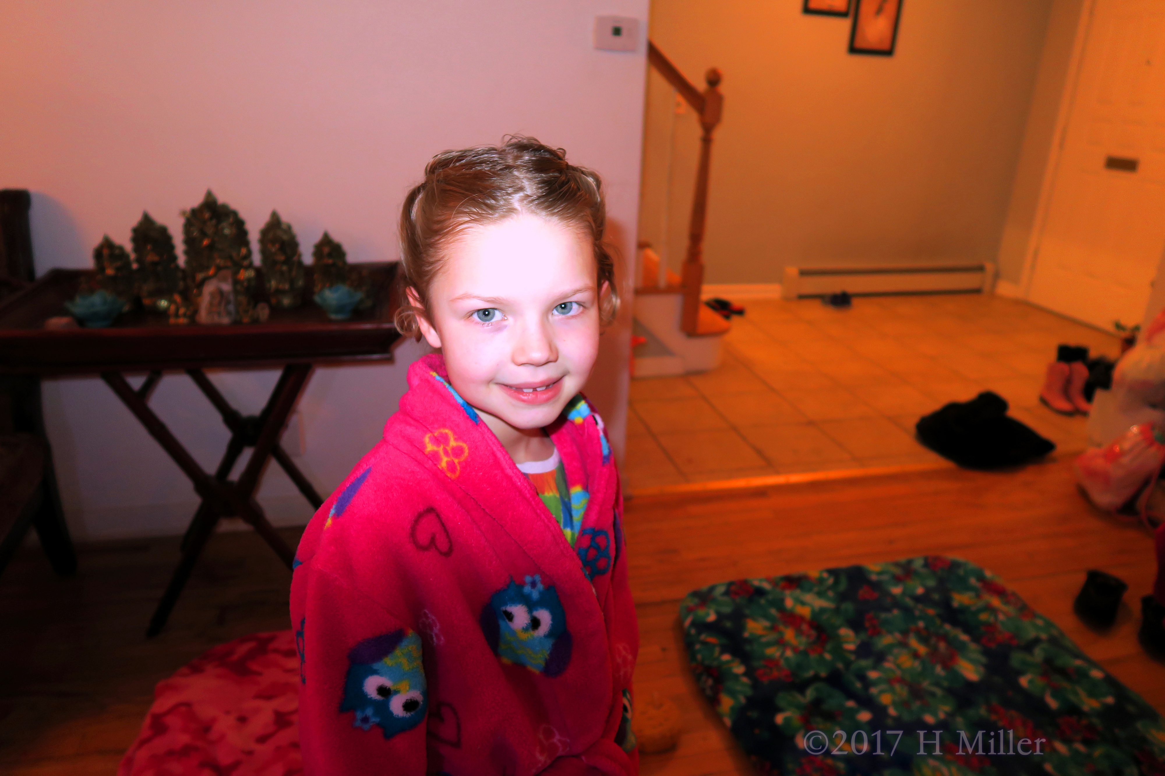 Smiling After Her Braided Girls Hairstyle Is Done. 