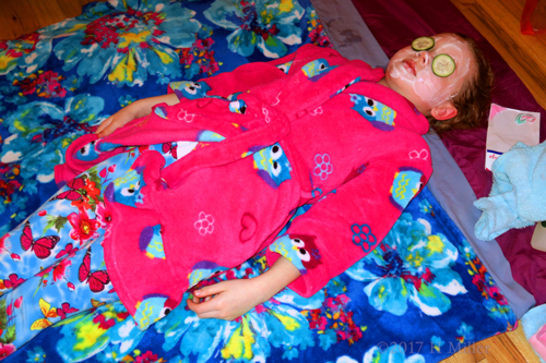 Relaxing Peacefully With Her Kids Facial Masque On. Relaxing Peacefully With Her Kids Facial Masque On.