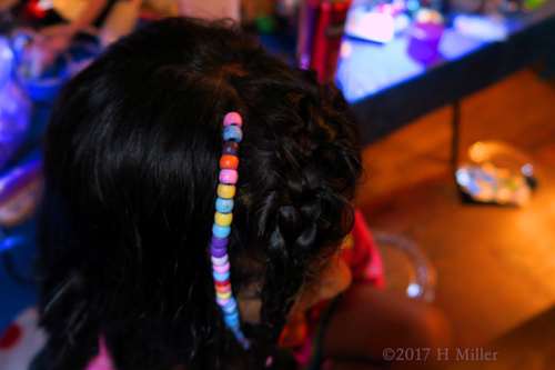 What A Cute Bead Strand, Braid, And Curls For The Birthday Girl's Hairstyle At The Spa!