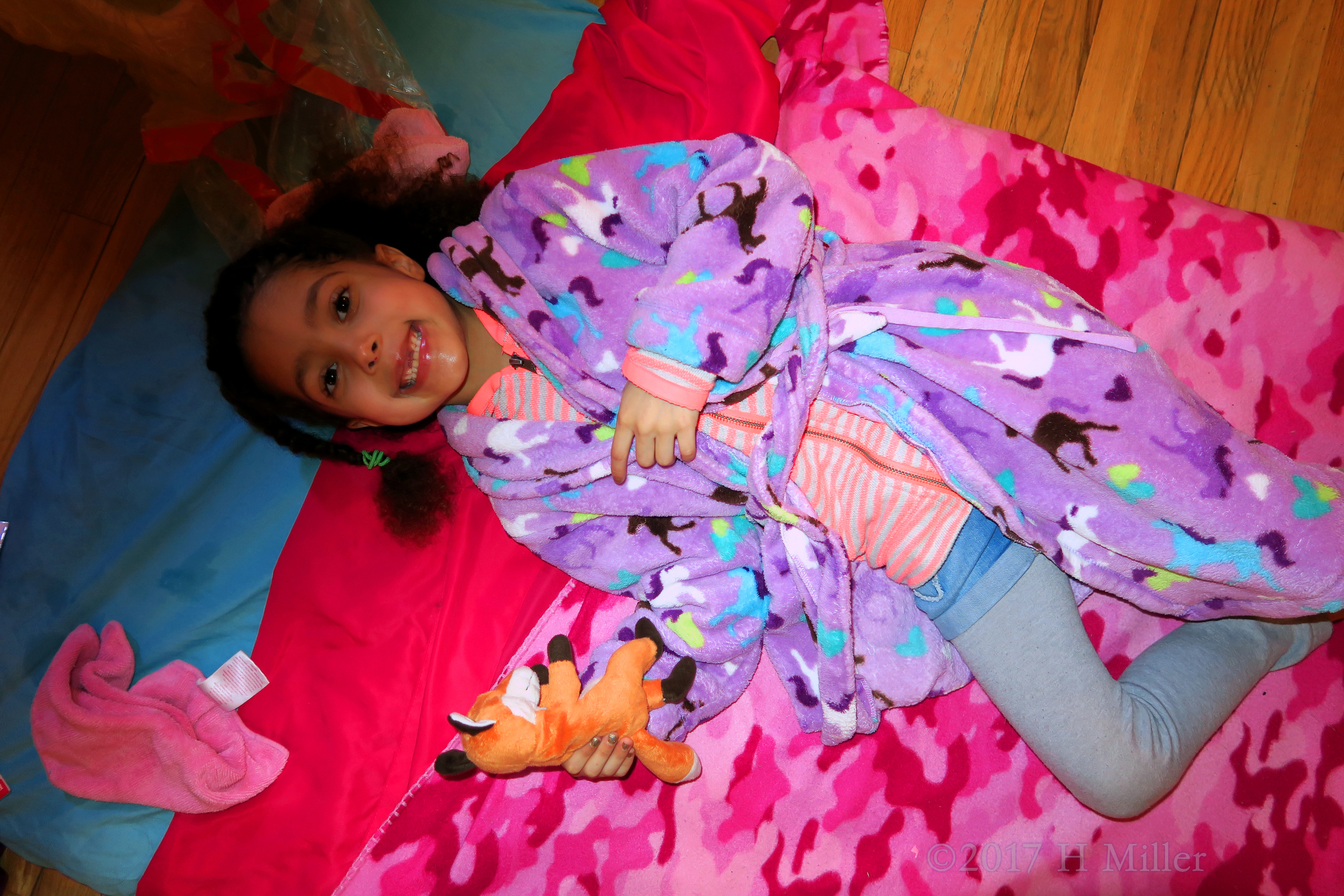 Smiling Before Her Girls Facial With Her Stuffed Animal Friend. Smiling Before Her Girls Facial With Her Stuffed Animal Friend.