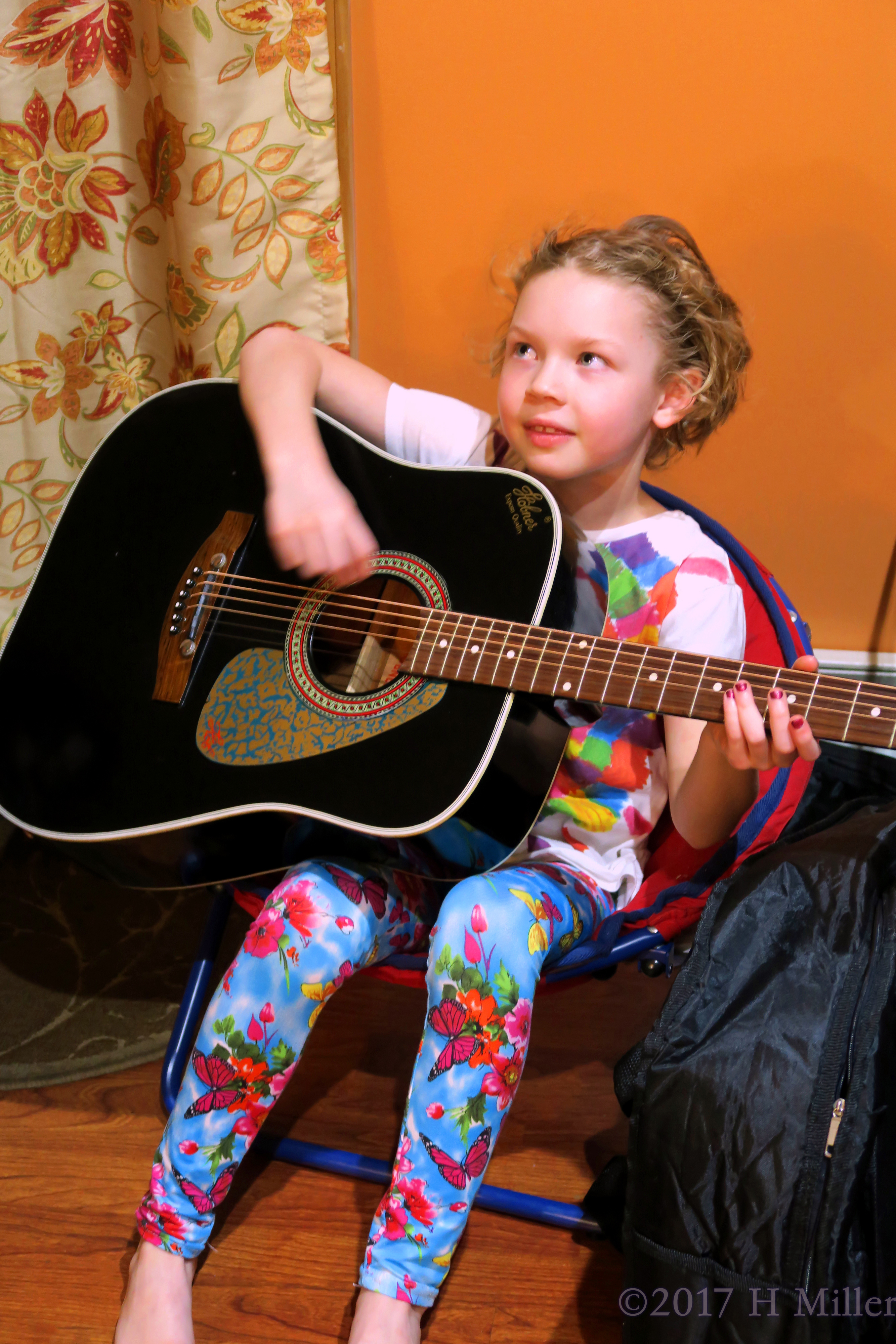 This Spa Party Guest Has A Turn On The Guitar! This Spa Party Guest Has A Turn On The Guitar!