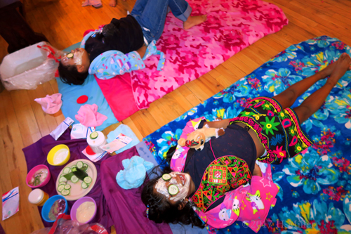 Friends Relaxing Together During Their Facials For Kids