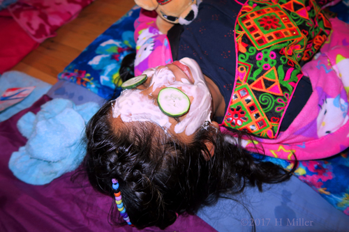 Smiling And Relaxing During Her Facial For Kids.