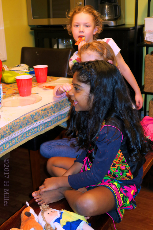 The Birthday Girl Is Having Pizza. The Birthday Girl Is Having Pizza.