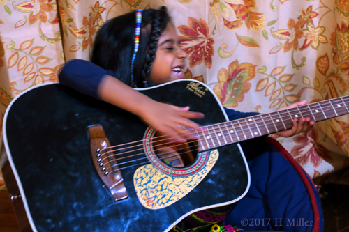 The Birthday Girl Laughing And Playing Guitar!