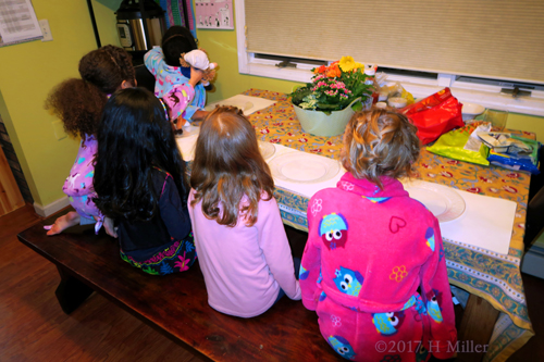 The Girls Are Gathered Around For Pizza!