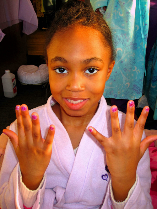 Showing Her Mini Mani At The Nail Spa.