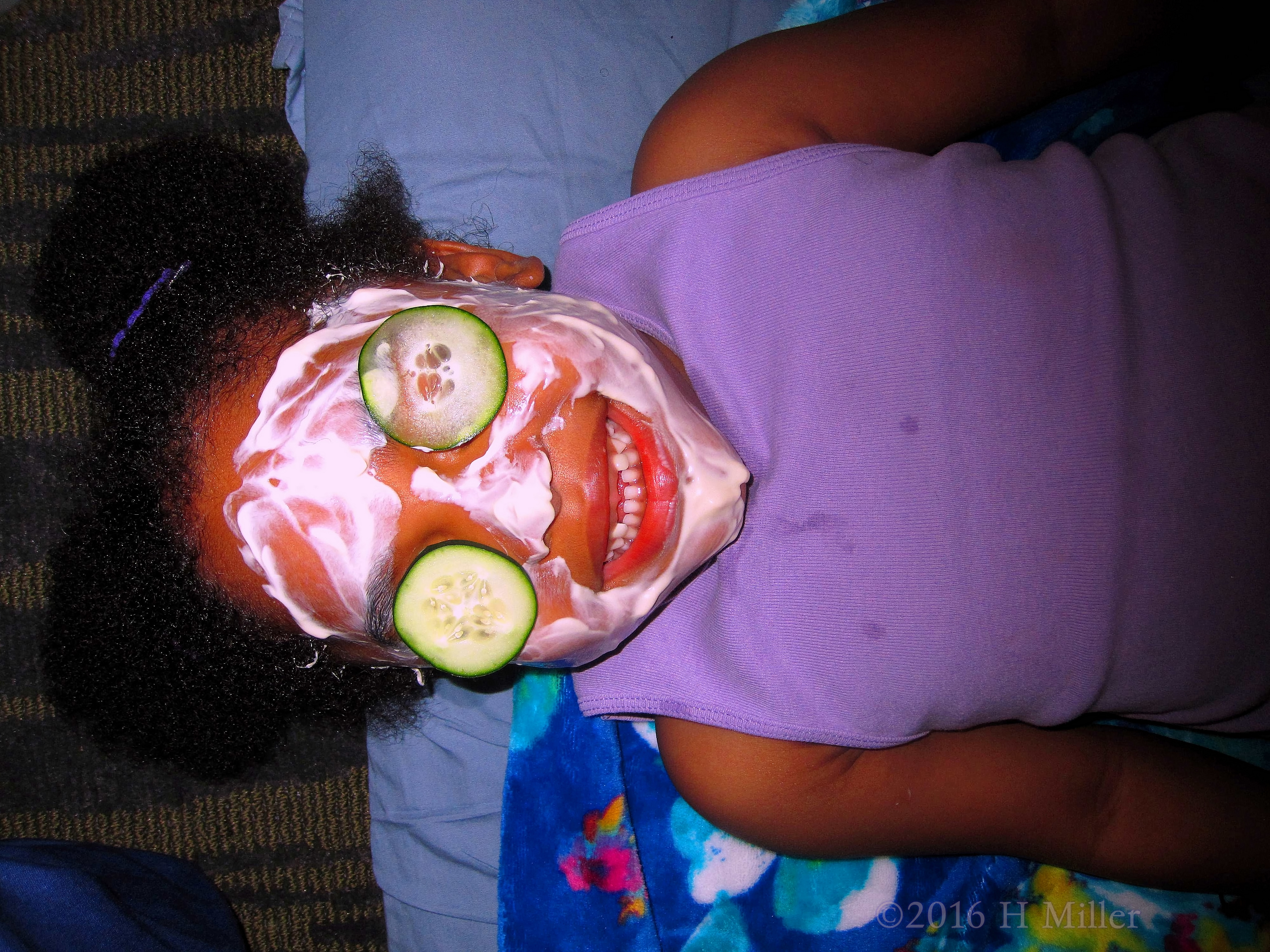 Kids Facials With Face Masque And Cucumbers On The Eyes. 