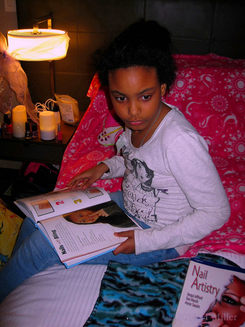 Checking Out Nail Art Designs At The Spa Party For Girls. Checking Out Nail Art Designs At The Spa Party For Girls.