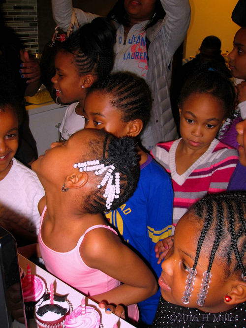 Everyone Is Gathered Around The Kids Spa Cupcake Table. Everyone Is Gathered Around The Kids Spa Cupcake Table.