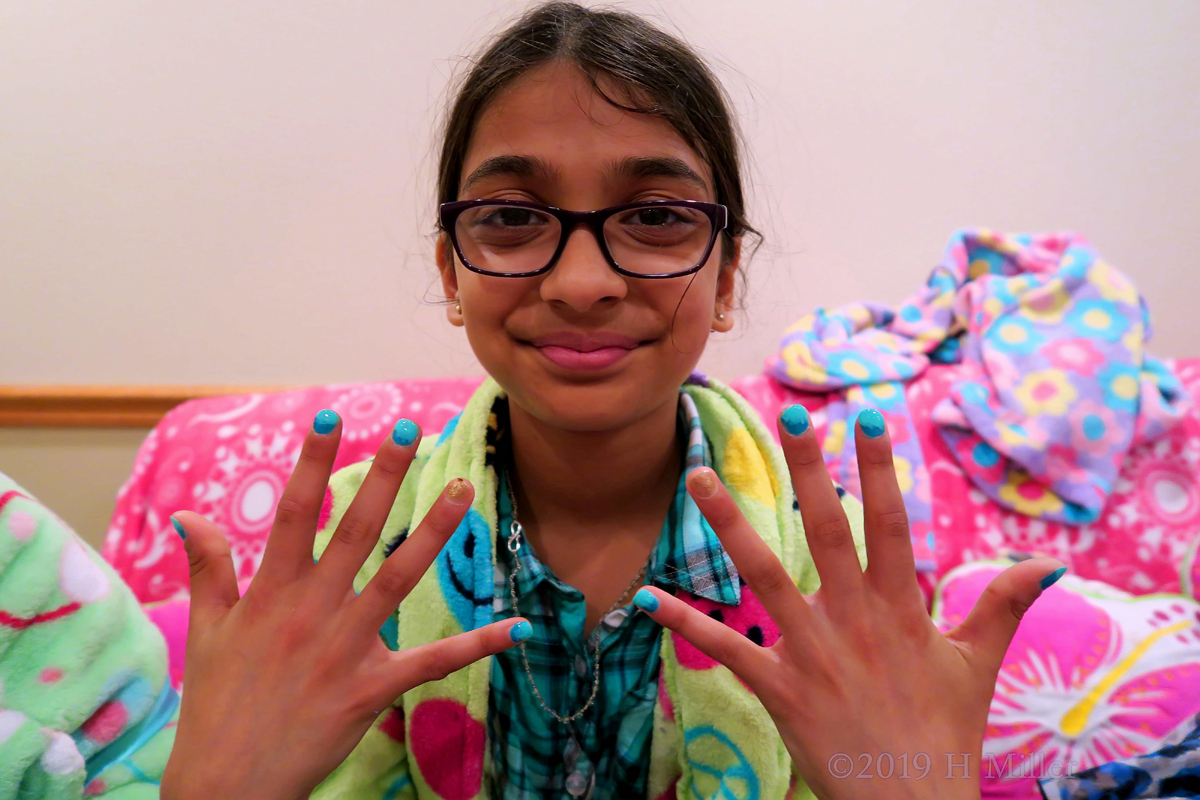 Happy Spa Birthday Guest Shows Off Lovely Blue And Gold Kids Manicure 