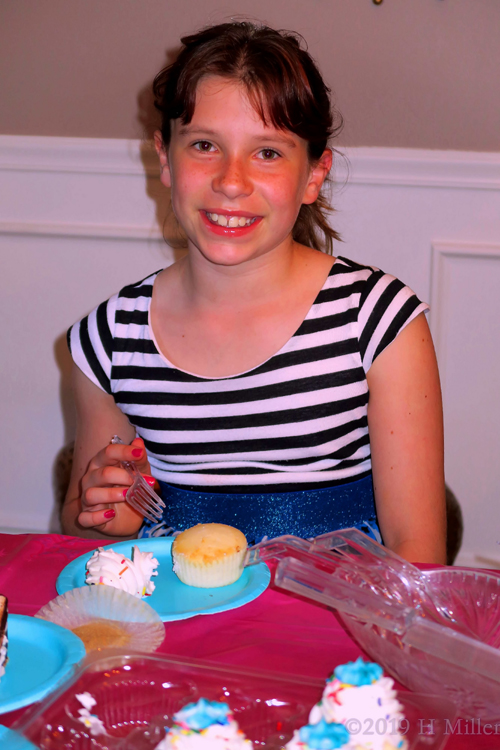 This Birthday Guest Is About To Dig Into Her Yummy Cupcake! This Birthday Guest Is About To Dig Into Her Yummy Cupcake!