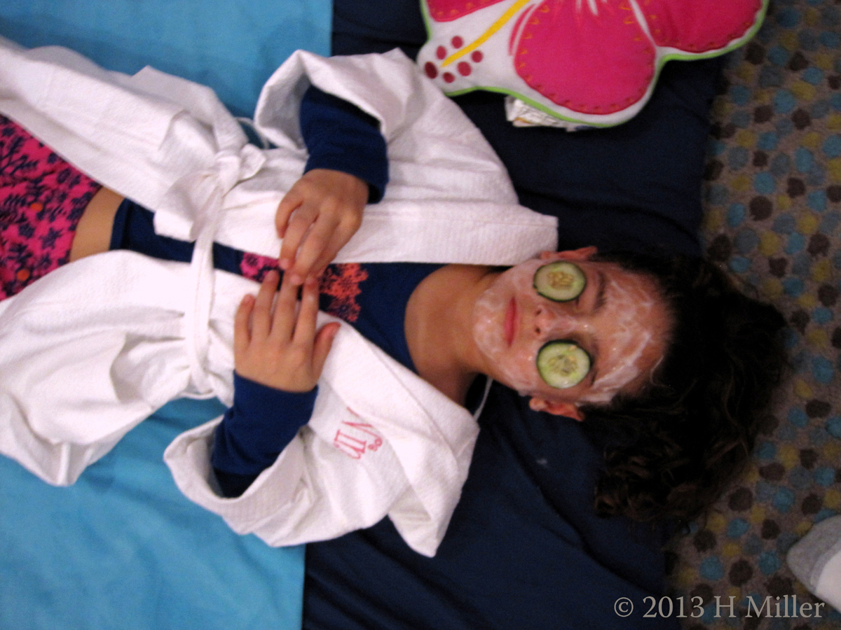 The Birthday Girl Relaxing During Her Facial The Birthday Girl Relaxing During Her Facial