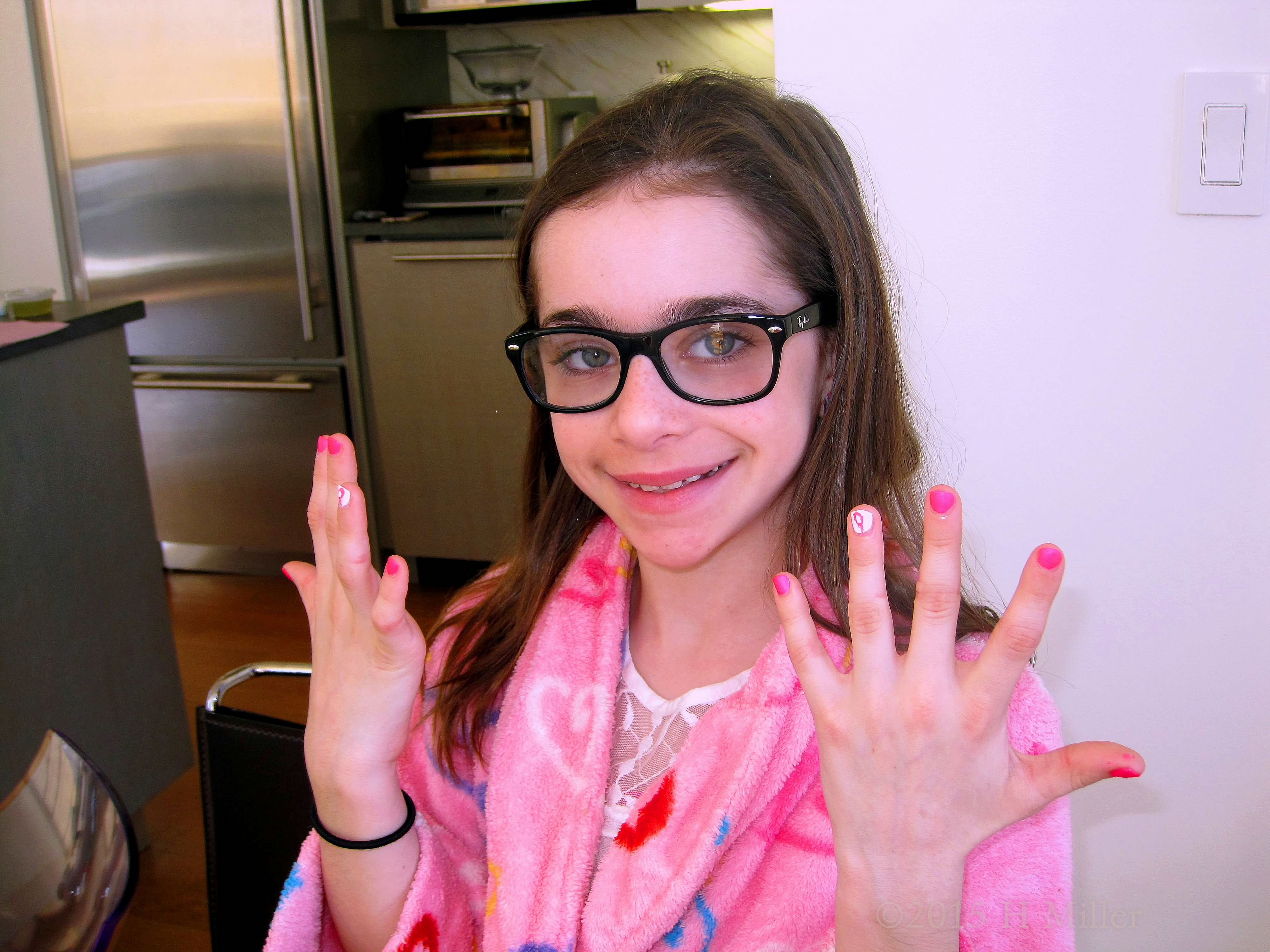 Holding Up Her Nails For The Camera. Holding Up Her Nails For The Camera.