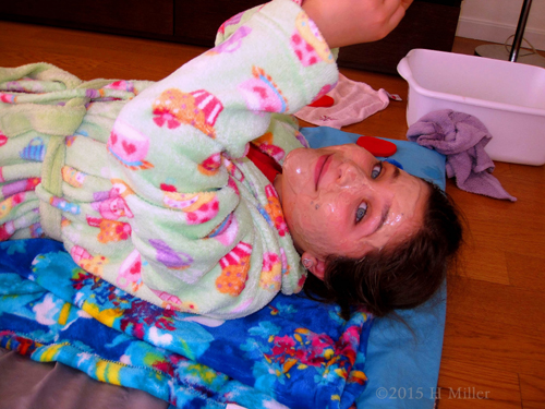 Removing The Cukes From Her Eyes For A Sec.