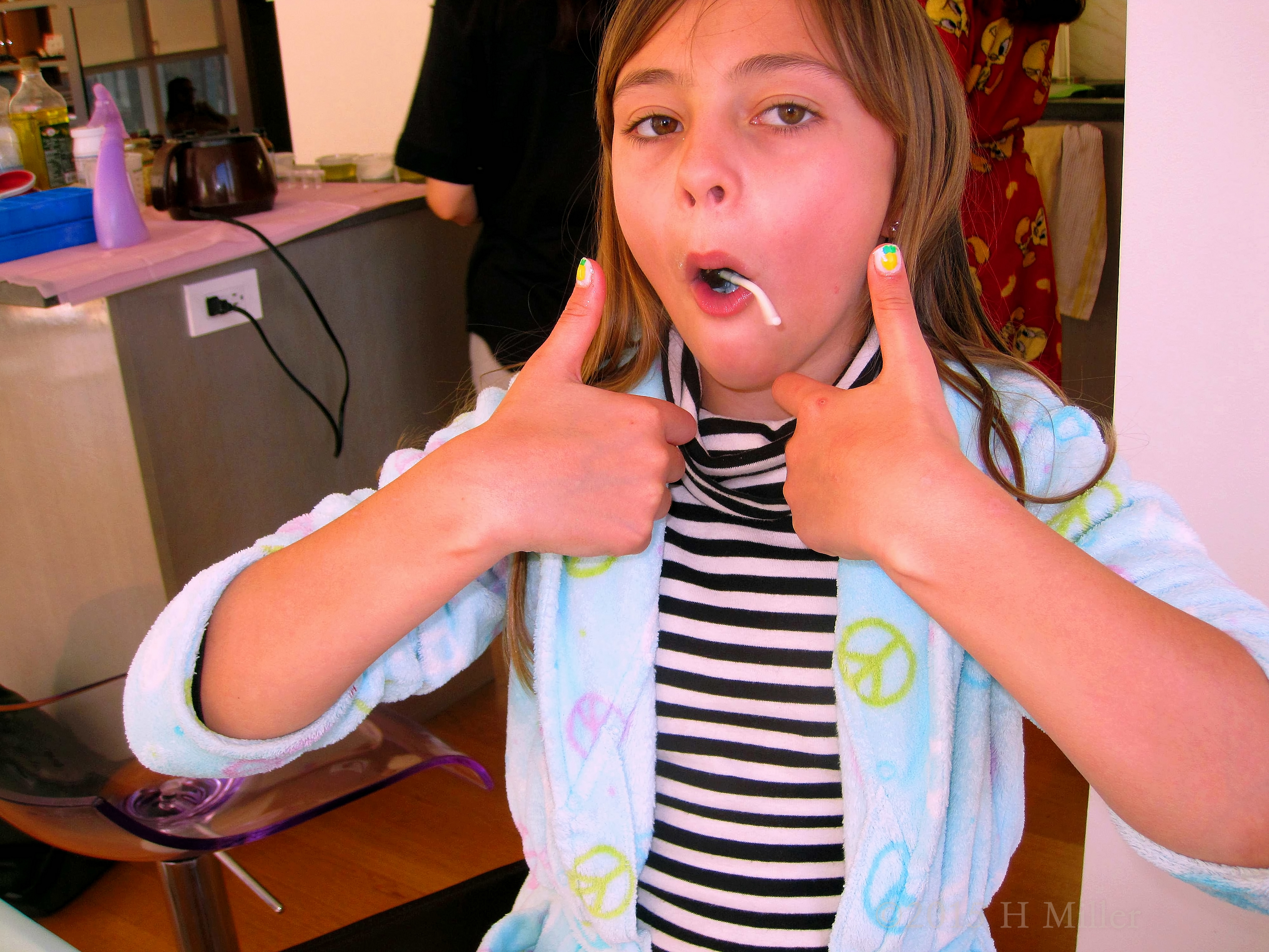 Holding Up Her Nails For The Camera. Holding Up Her Nails For The Camera.