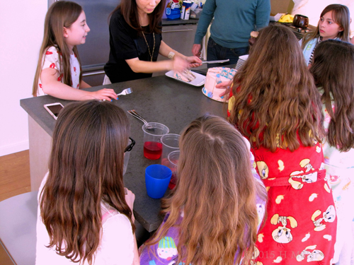 Cake Slices Being Plated. Cake Slices Being Plated.