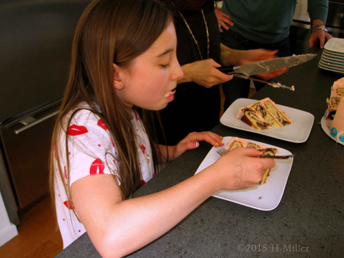 The Birthday Girl Eating Her Cake. The Birthday Girl Eating Her Cake.