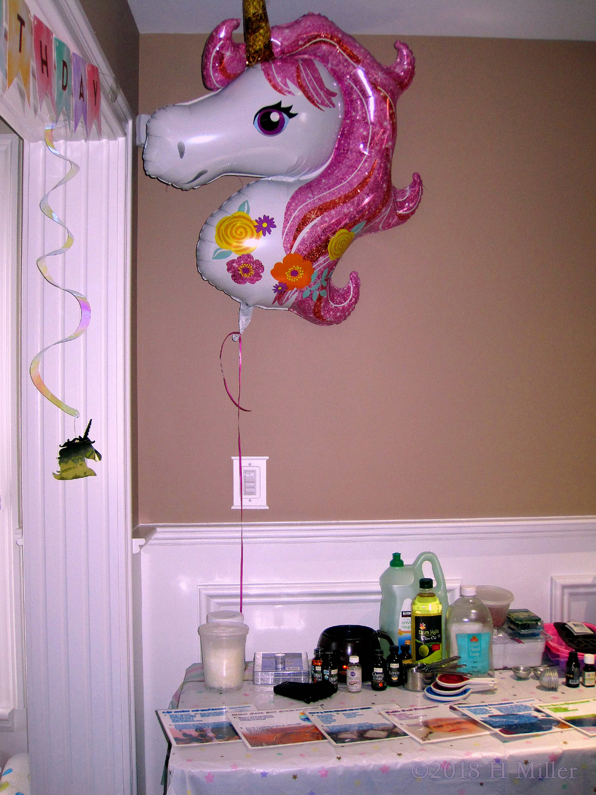 Beautifully Set Kids Crafts Table With A Unicorn Balloon And Unicorn Birthday Hanging Streamer! 