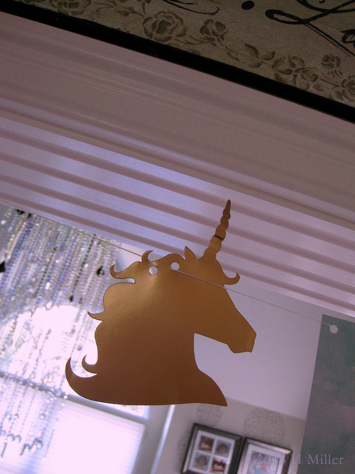 Big Golden Unicorn Decoration Hanging From The Ceiling, Looks Great! 