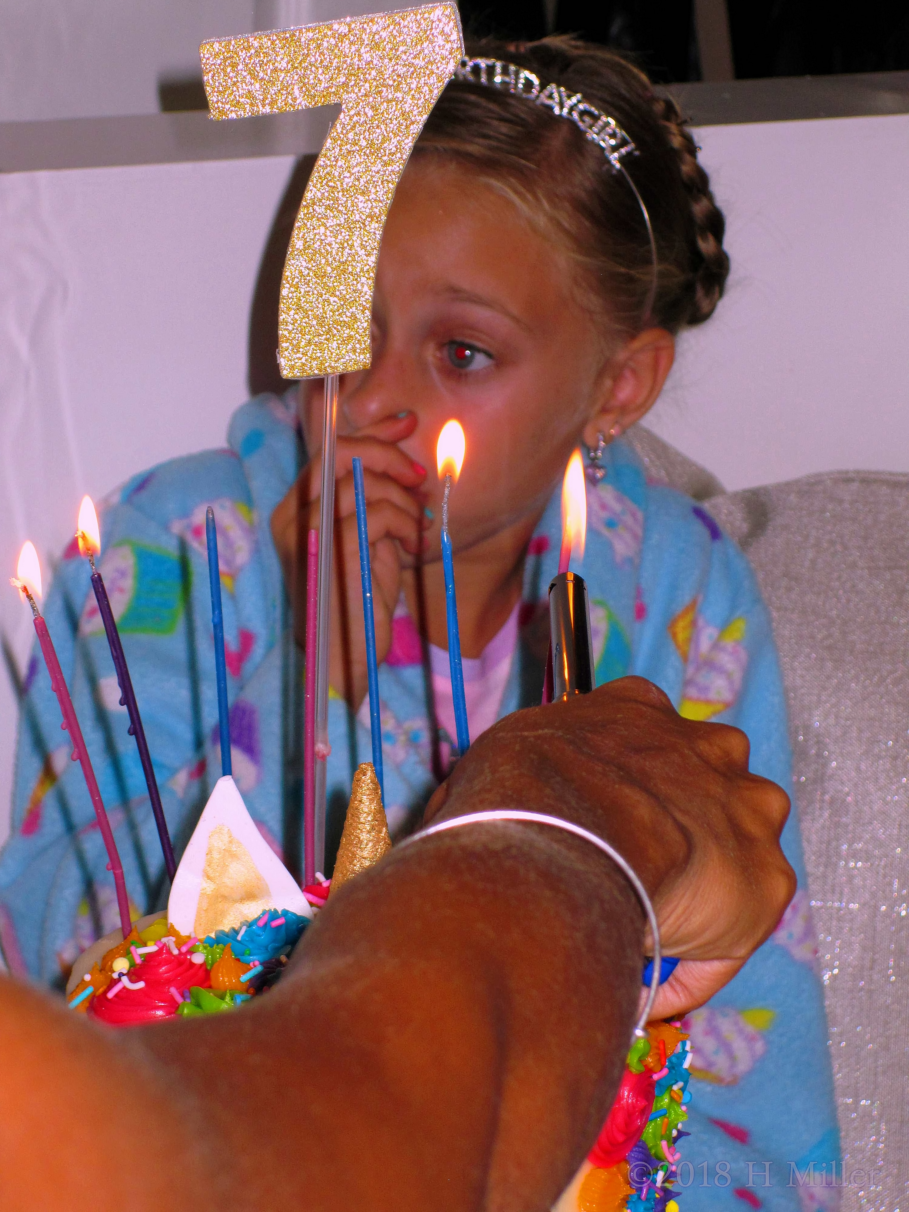 While Lighting The Birthday Candles. While Lighting The Birthday Candles.