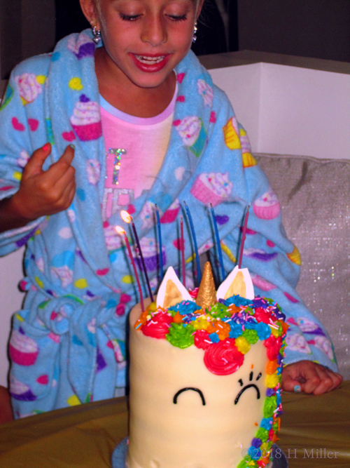 Olivia Has Blown Out Her Birthday Candles And Made A Wish. Olivia Has Blown Out Her Birthday Candles And Made A Wish.