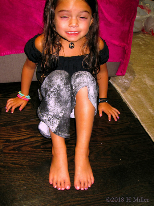 She's Showing Her Pretty Kids Pedicure. She's Showing Her Pretty Kids Pedicure.