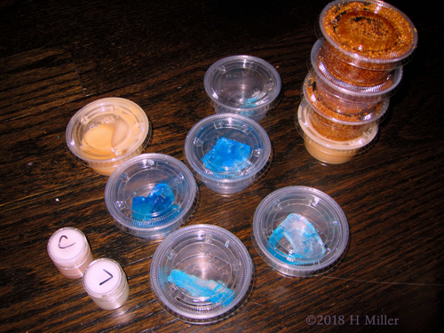 So Many Containers With Different Kids Crafts After Their Crafting Activities. They Made Lip Balm, Sugar Body Scrub, Bubble Bath And Soap. So Many Containers With Different Kids Crafts After Their Crafting Activities. They Made Lip Balm, Sugar Body Scrub, Bubble Bath And Soap.